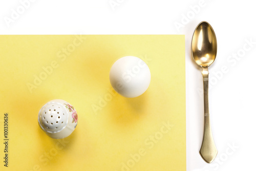 egg, salt cellar and brass spoon
