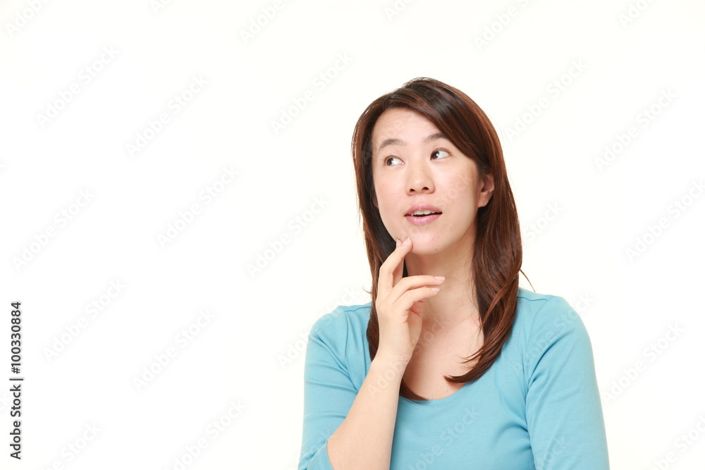 Japanese woman thinks about something Japanese woman thinks about something