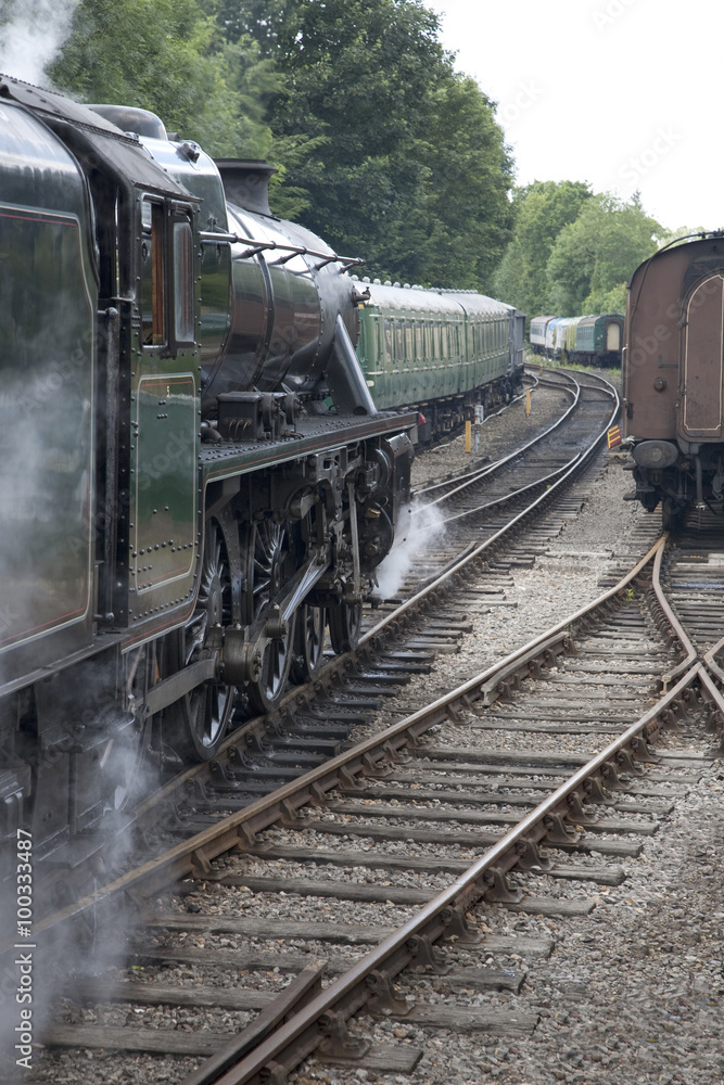 Naklejka premium Stream Train on Railway Tracks