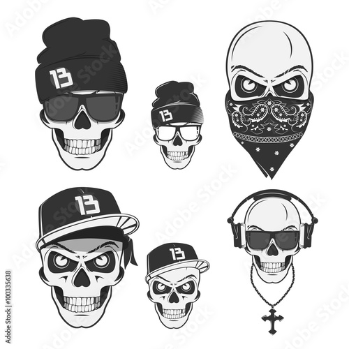 Set of vintage skull rap emblems, labels, badges, logos and design elements. Monochrome style.