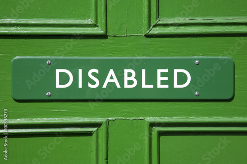 Green Disabled Sign on Door