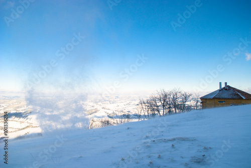 Snow wind in mountains © oksix