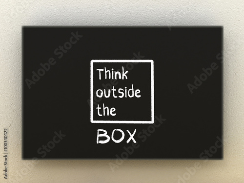 Think outside the box illustration on black board.