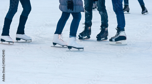 legs of people skating closeup