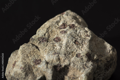 pyrope in the rock, tiny crystals of garnet