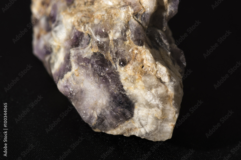 crude crystal amethyst with black background crude crystal amethyst with black background