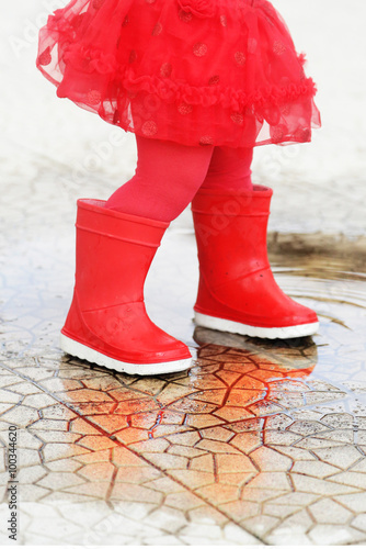 Red rain boots © Evgenia Smirnova