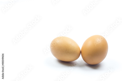 Two brown chicken egg isolated on white
