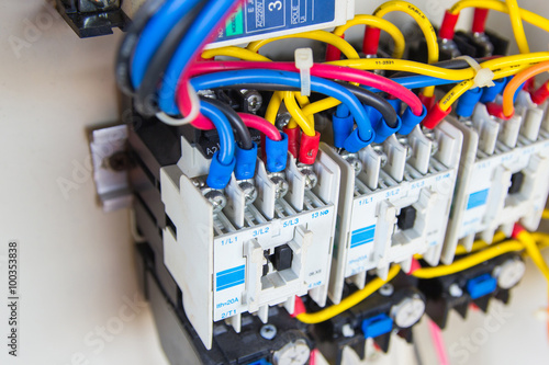 Close up circuit breakers and wire in control panel