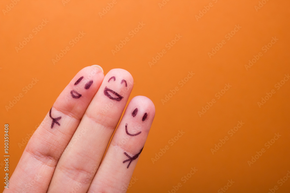 Fototapeta premium three smiling fingers that are very happy to be friends
