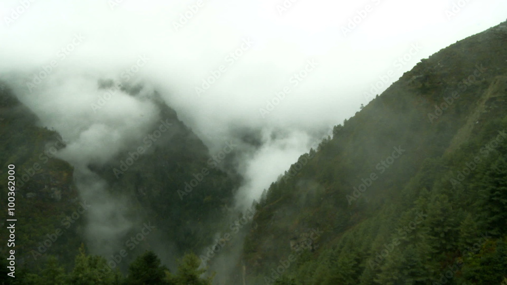 Mountains shrouded in mist and clouds. Mountains shrouded in mist and clouds.