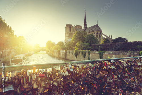 Canvas Print View of Notre Dame cathedral in Paris with famous locks of love