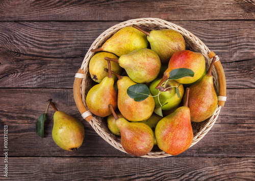 Delicious pears in a basket