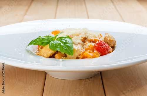 Traditional italian pasta with cured tomato