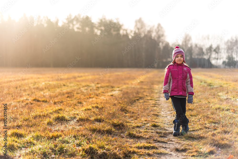 Little girl on a meadow