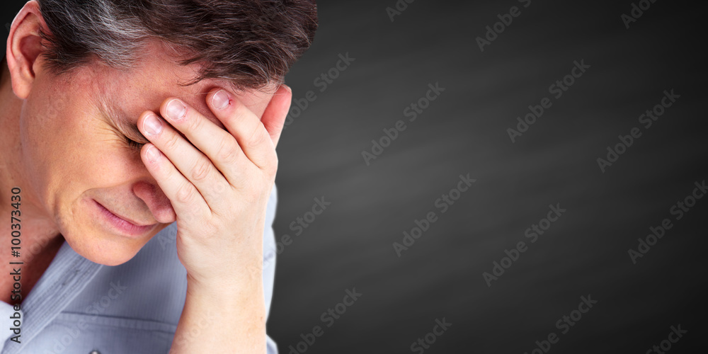 Man having a migraine headache. Man having a migraine headache.