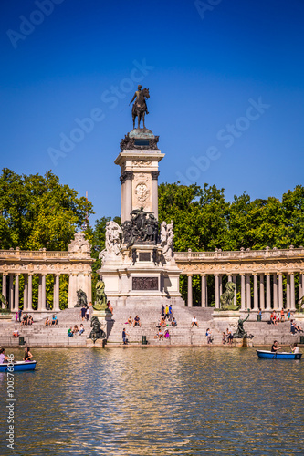 Madrid, Spain - 15, JUNE,2014: people riding small boats at Parq
