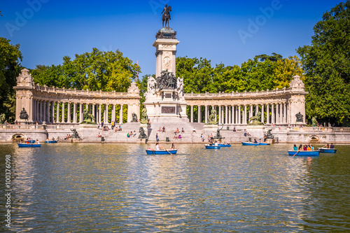 Madrid, Spain - 15, JUNE,2014: people riding small boats at Parq