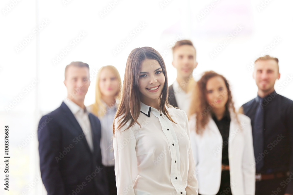 Photo of young business people in a conference room Photo of young business people in a conference room