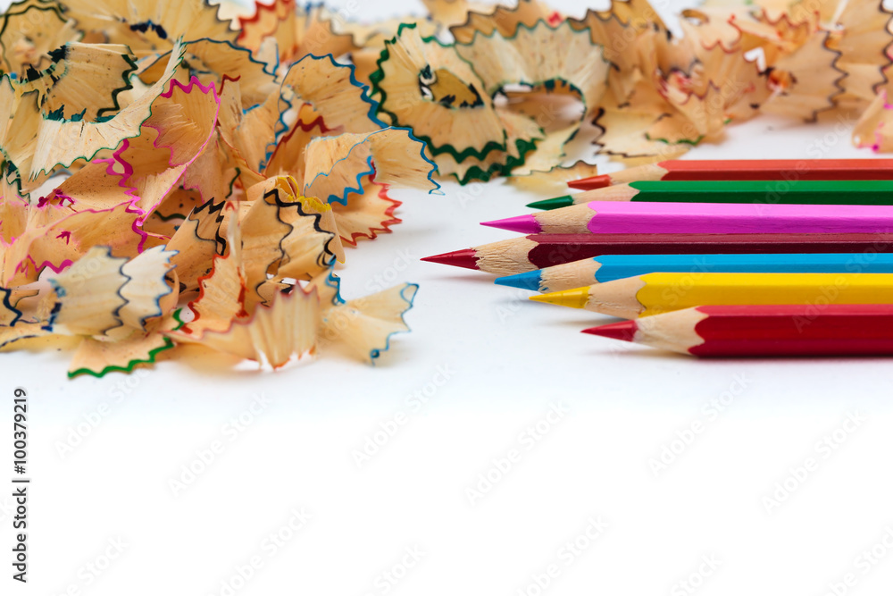Sharp pencil with shavings lie on the office desk Sharp pencil with shavings lie on the office desk