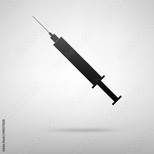 Syringe black icon.