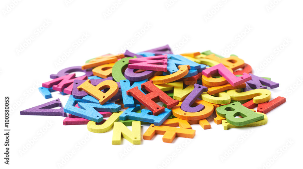Pile of colorful wooden letters isolated Pile of colorful wooden letters isolated