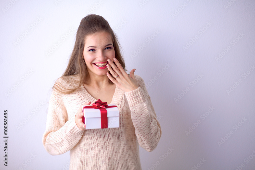 Young woman happy smile hold gift box in hands Young woman happy smile hold gift box in hands