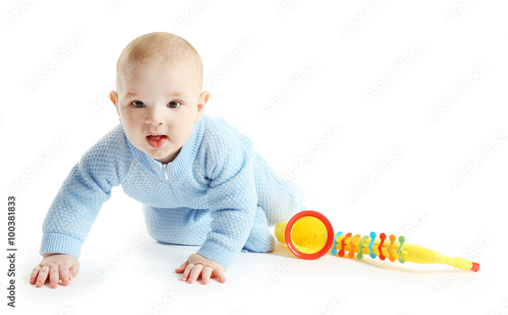 Adorable baby with plastic colourful saxophone isolated on white background Adorable baby with plastic colourful saxophone isolated on white background