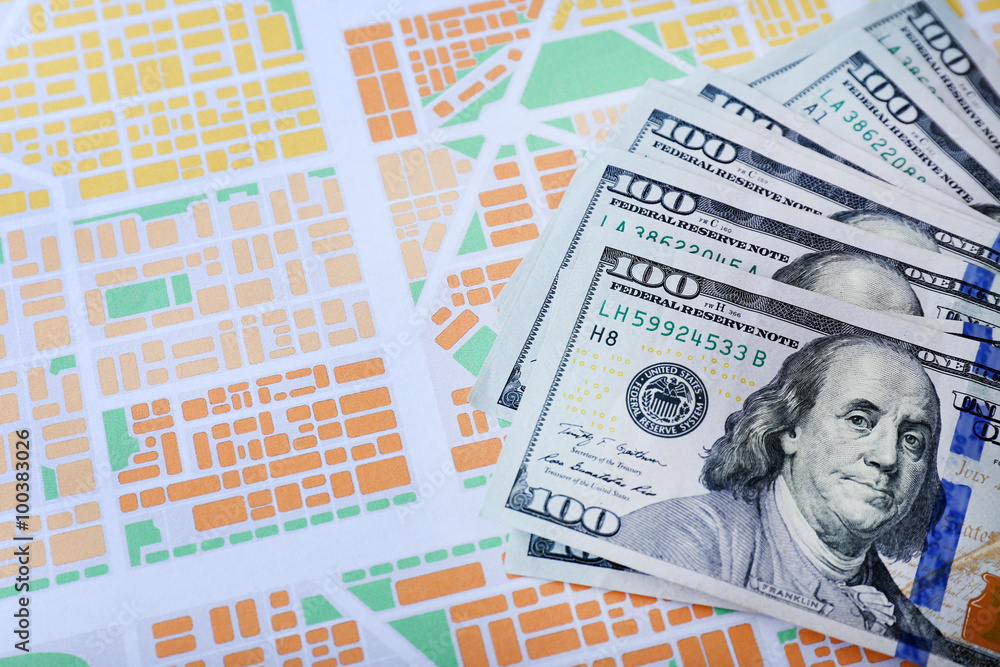 Cash on the city map background, close up Cash on the city map background, close up