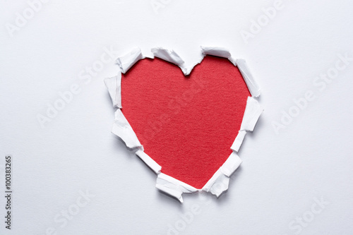 Heart shape handmade on white paper. Love and romance concept