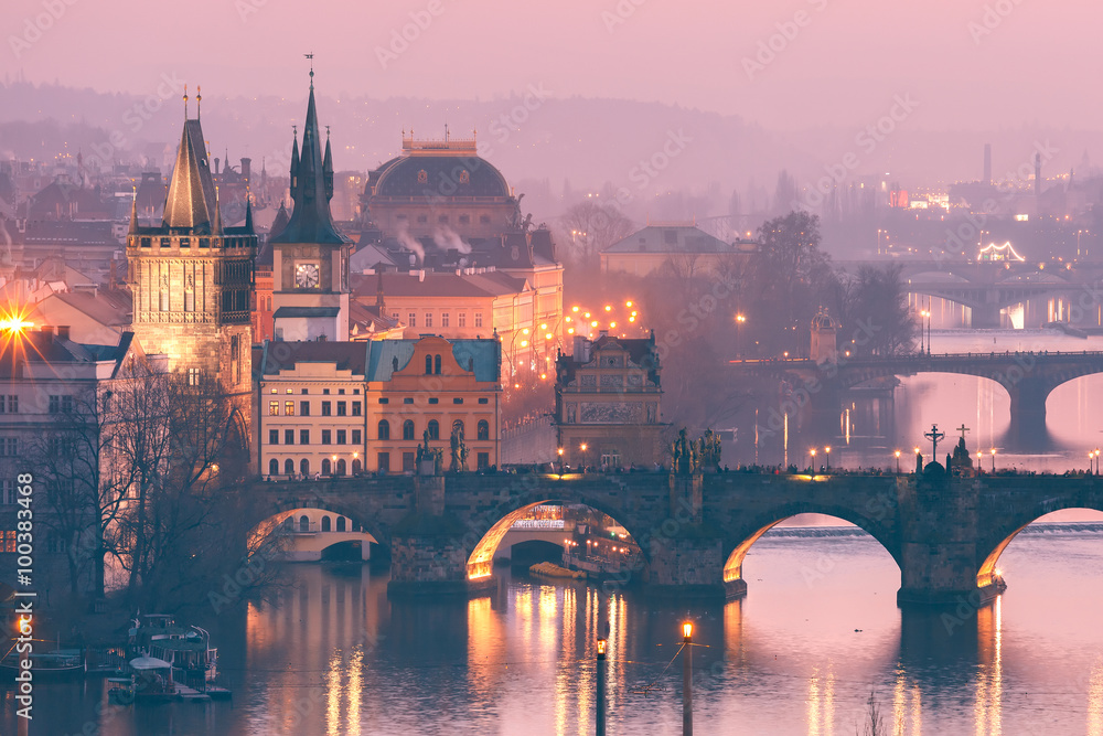 Fototapeta premium Top view over Old Town and bridges over Vltava River in Prague, Czech Republic