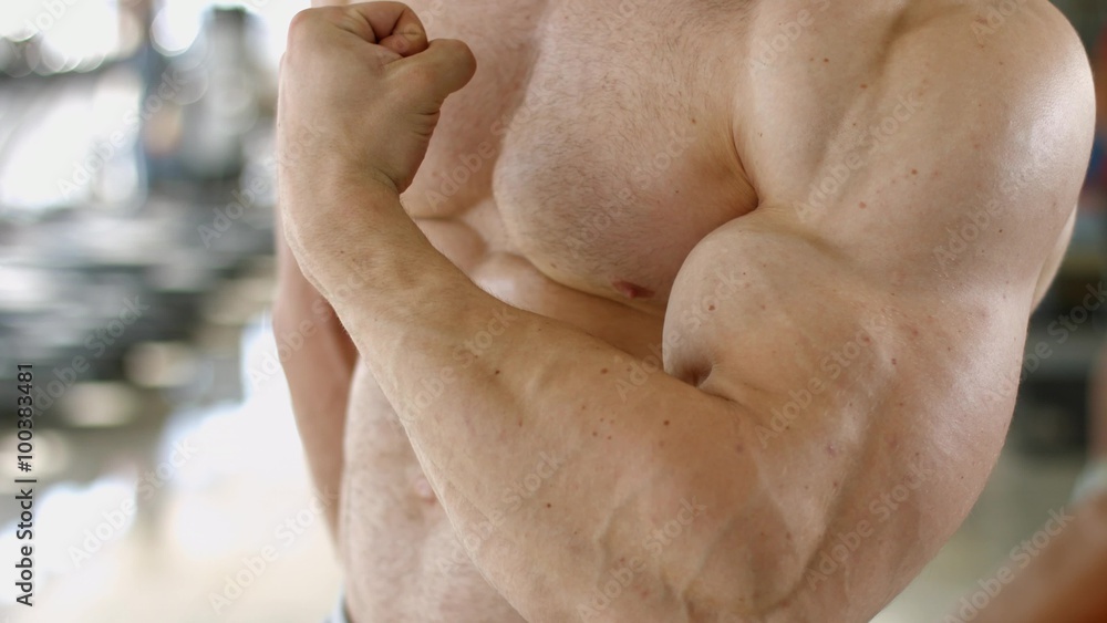 Bodybuilder with huge muscles. Bodybuilder with huge muscles.