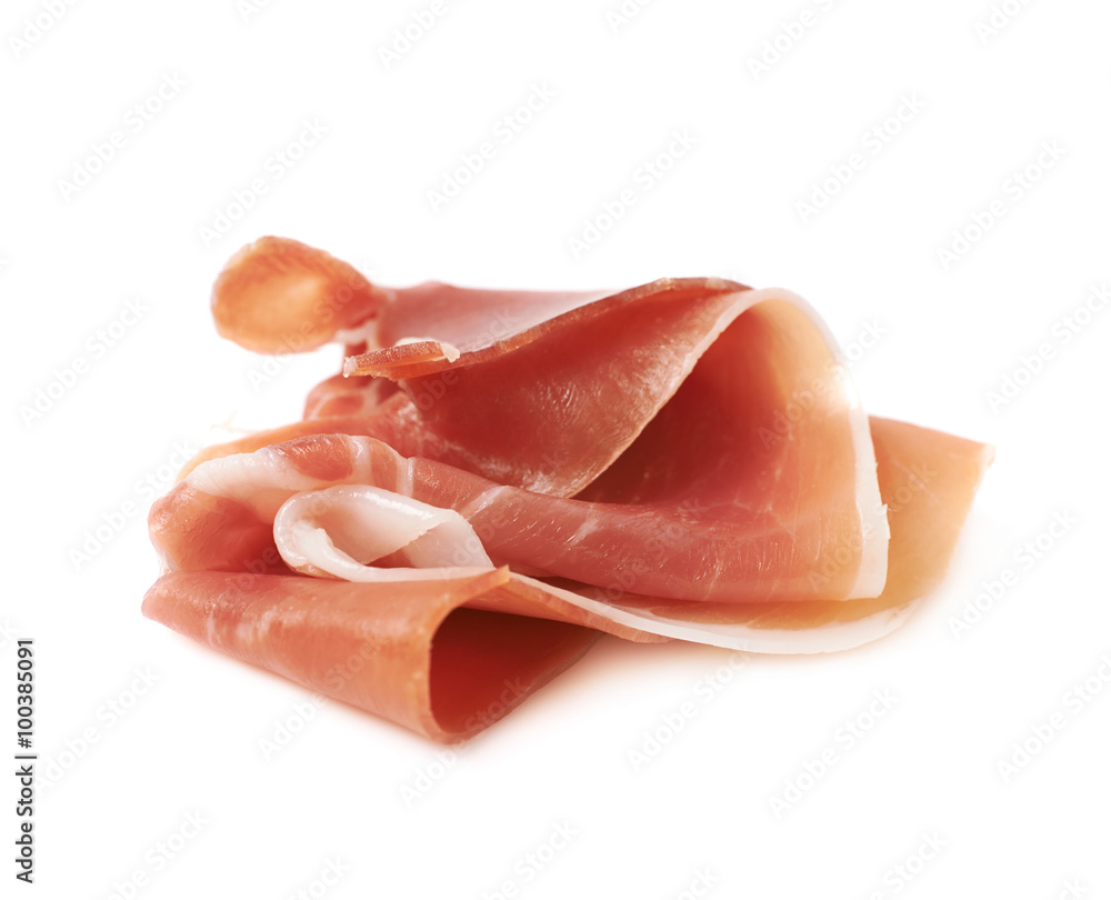 Folded prosciutto ham slice isolated