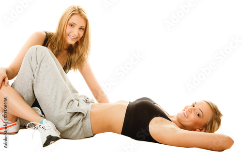 two young sporty women after intense workout