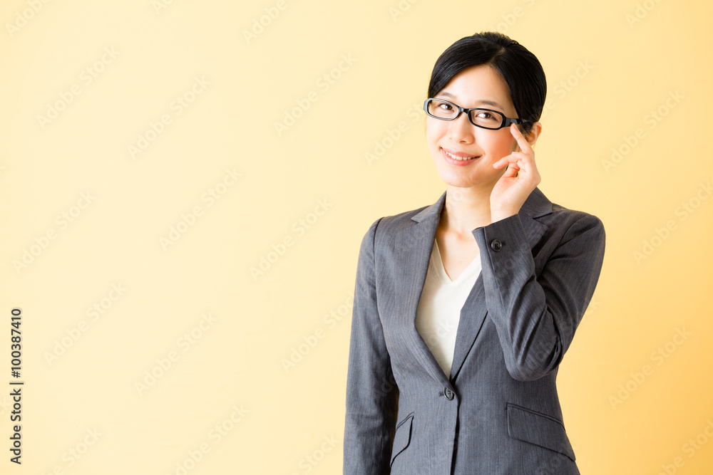 asian businesswoman isolated on yellow background asian businesswoman isolated on yellow background