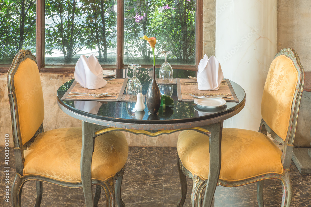Fotografie Fine restaurant dinner table place setting: napkin & wineglass