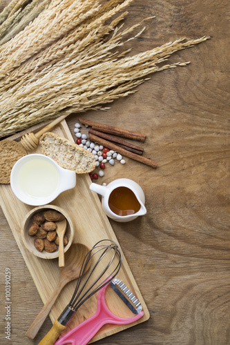 Food ingredients , kitchen utensils for cooking on wooden backgr