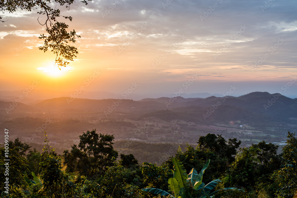 Light of sunset with mountains background in thailand 