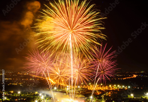 Fireworks on night city background