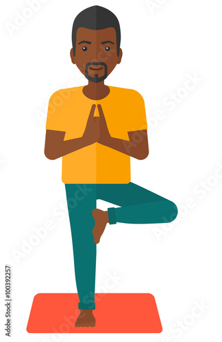 Man practicing yoga.
