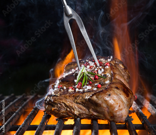 Beef steak on the grill.