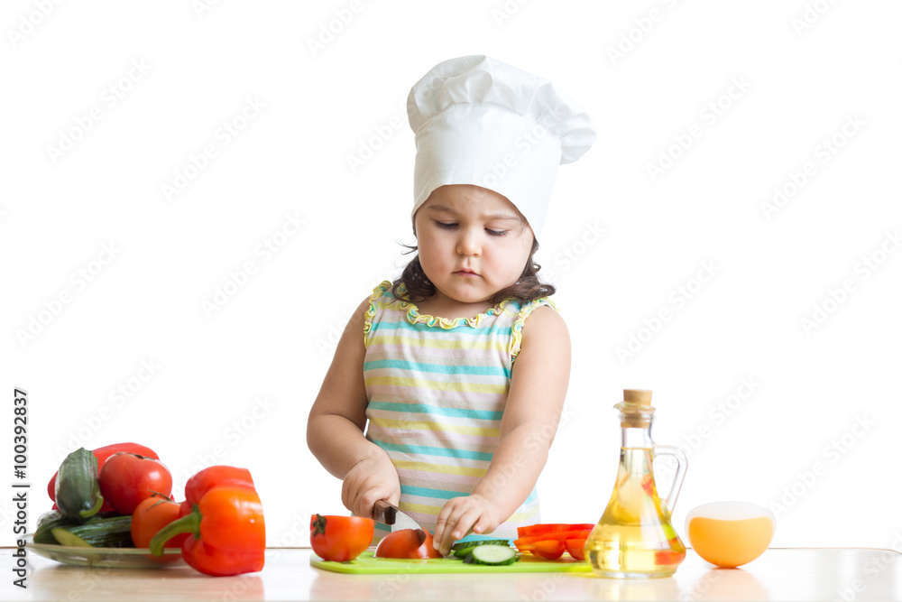 Child girl preparing healthy food in the kitchen Child girl preparing healthy food in the kitchen
