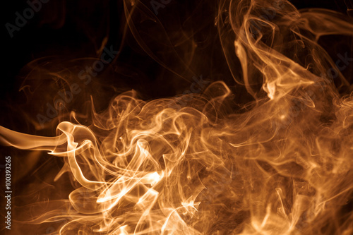 Movement gold smoke on black background.