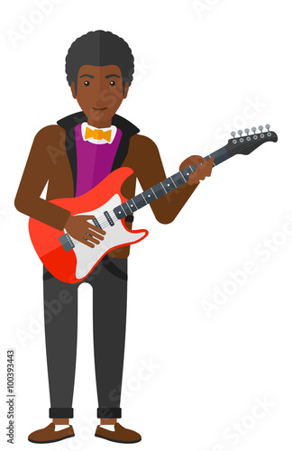 Musician playing electric guitar.