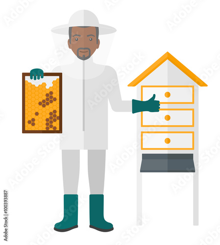Bee-keeper at apiary.