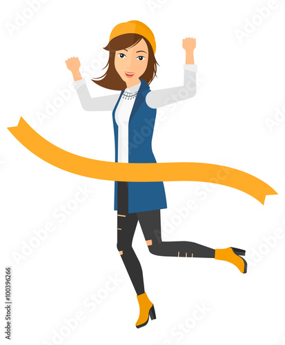 Business woman crossing finish line.