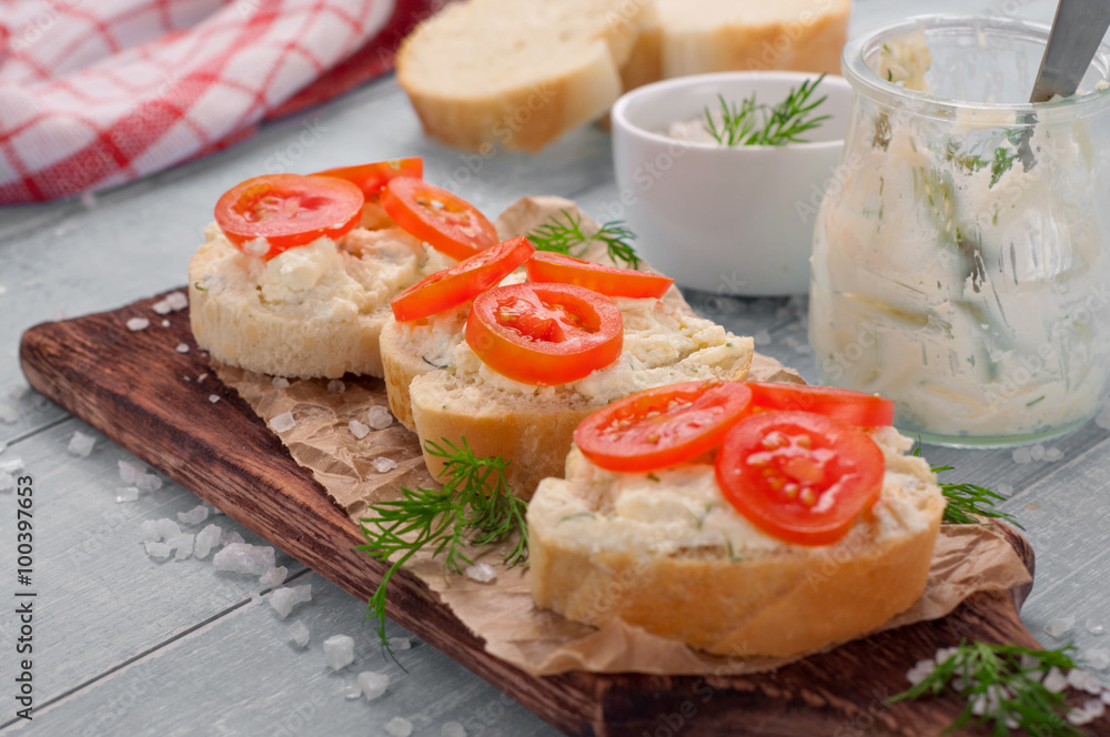 closeup sandwich with cheese, tomatoes and parsley closeup sandwich with cheese, tomatoes and parsley