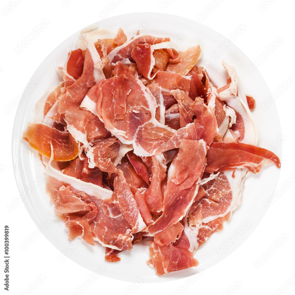 top view of thin sliced jamon on plate isolated top view of thin sliced jamon on plate isolated