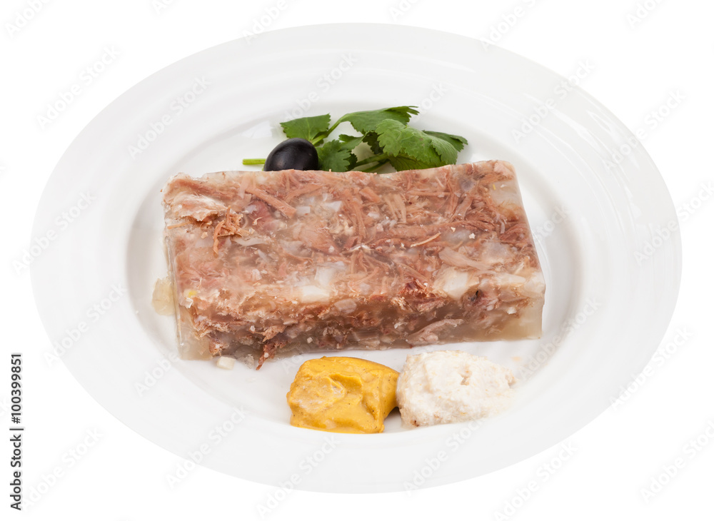 portion of meat aspic with seasonings on plate