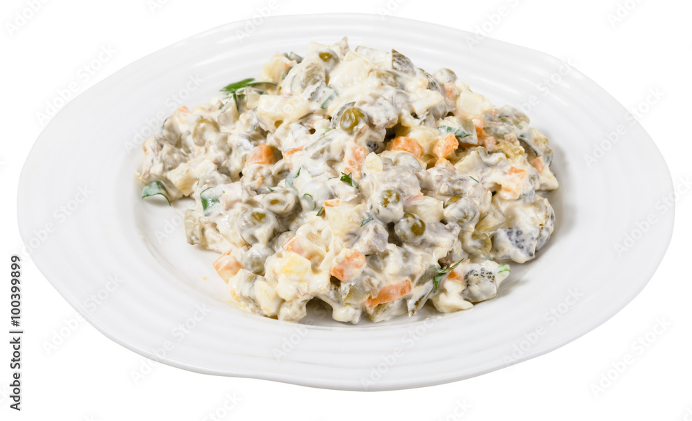 russian salad with mayonnaise on plate isolated russian salad with mayonnaise on plate isolated